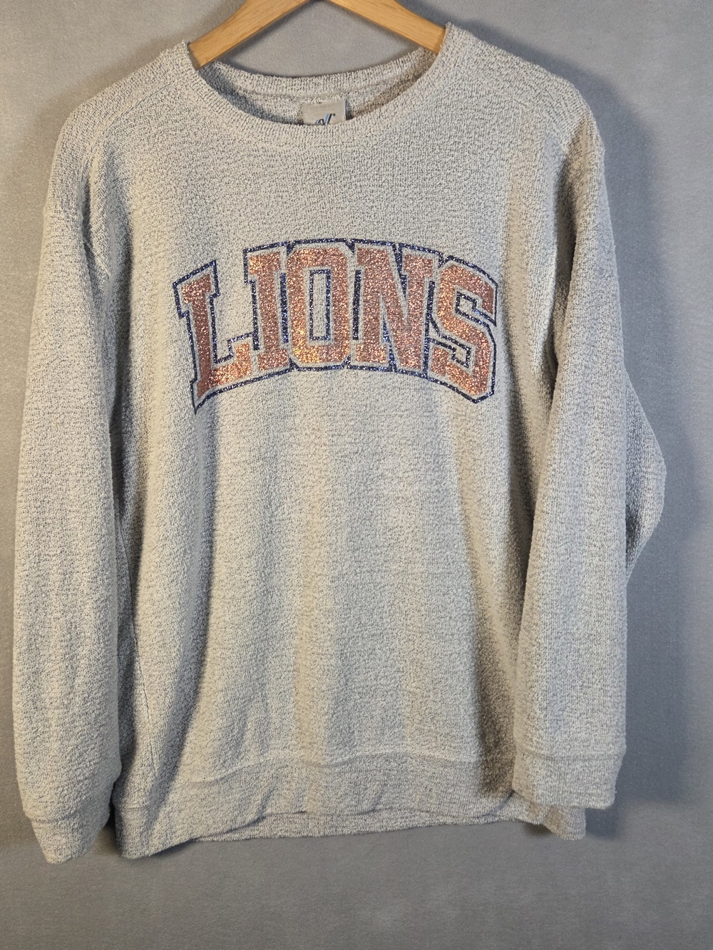 Varsity Spirit Lions crewneck sweatshirt with appliquéd orange glitter (Q674)